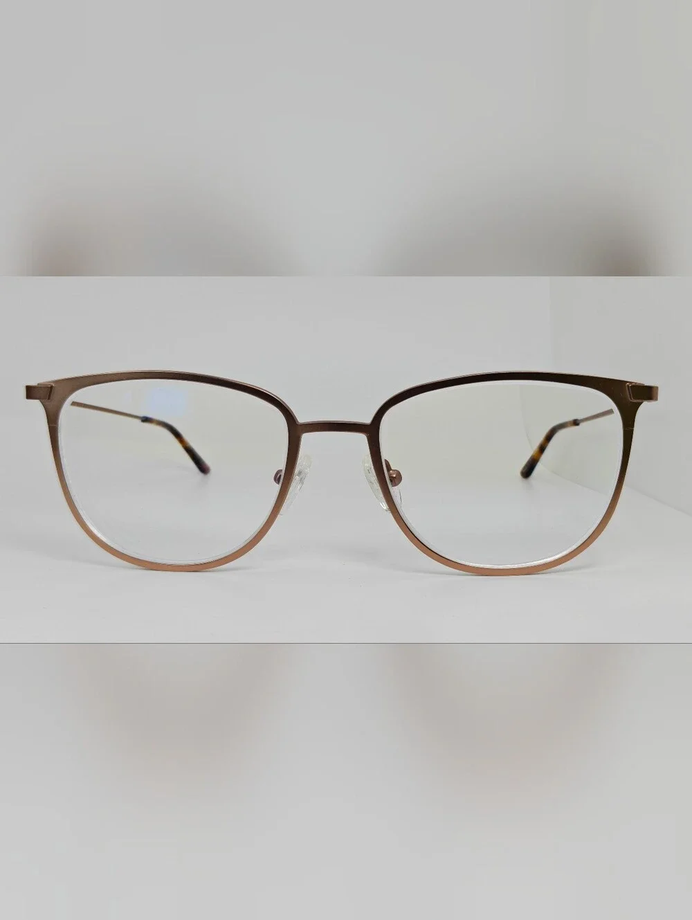 Vita. Metal Frame Eyeglasses in Copper Brown. Tortoise Temple Tips.